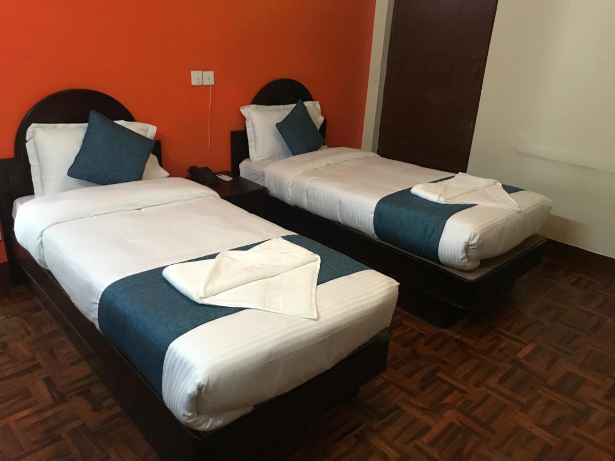 Quarto Deluxe com 2 Camas de Solteiro